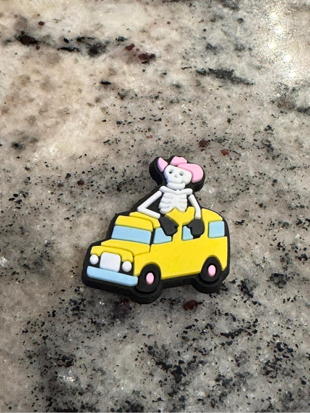 Yellow Toy Car Charm with Pink-Accented Skeleton Figure